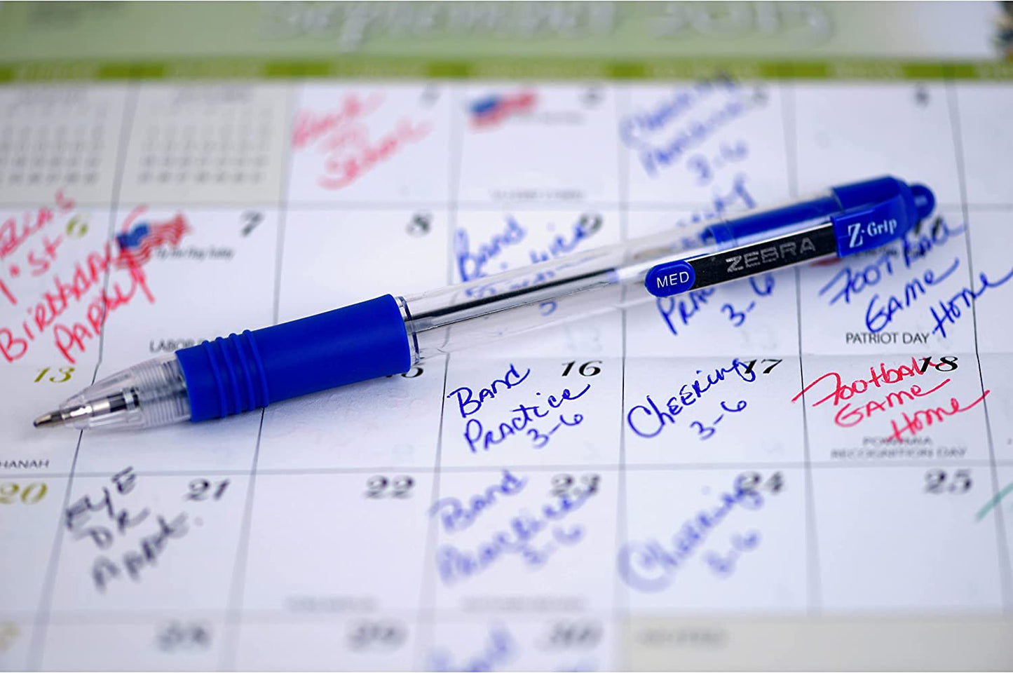 Zebra® Z-Grip™ Retractable Ballpoint Pens, Medium Point, 1.0 Mm, Clear Barrel, Blue Ink, Pack of 12