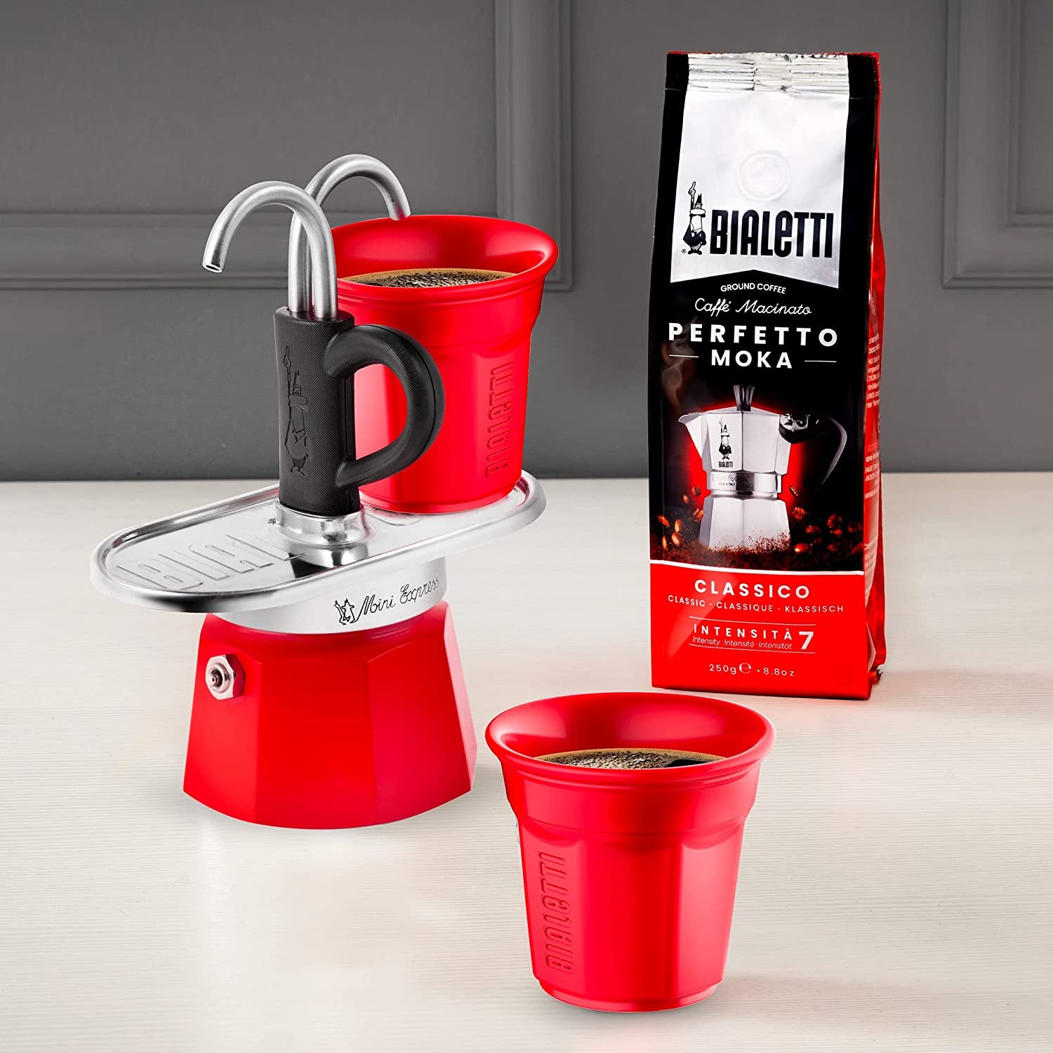 - Mini Express Color: Moka Set Includes Coffee Maker 2-Cup (2.8 Oz) + 2 Shot Glasses, Red, Aluminium
